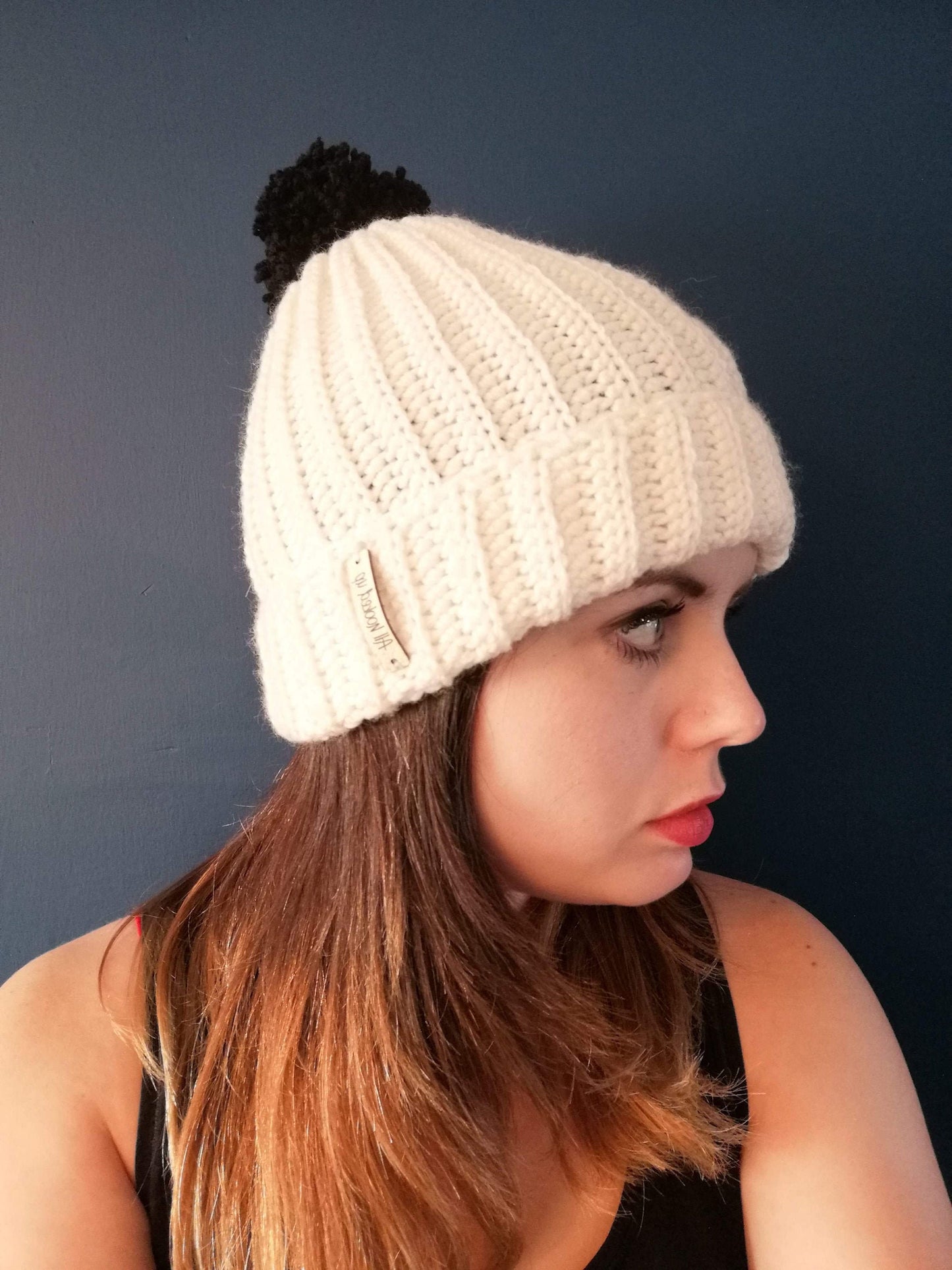 Cream Hat Black Pom Pom